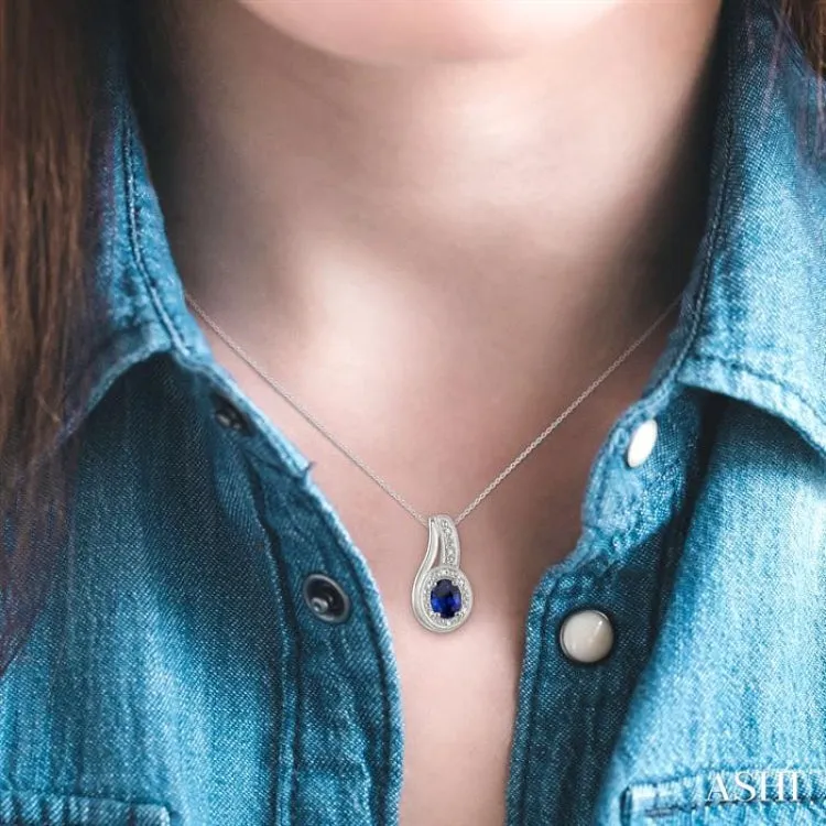 6x4 MM Oval Cut Sapphire and 1/50 Ctw Round Cut Diamond Pendant in Sterling Silver with Chain