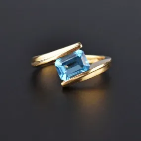 Estate Solid Gold Channel Set Blue Topaz Ring