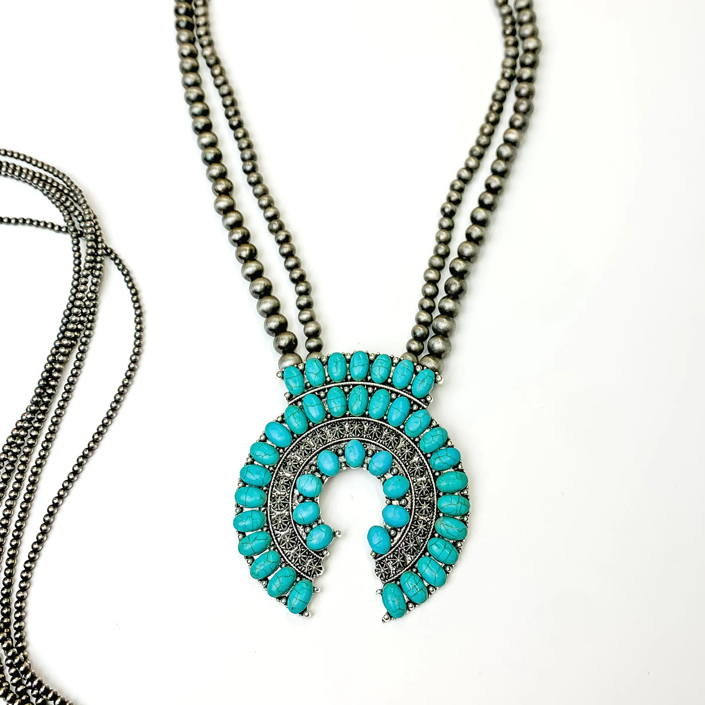 Oval Pendant Necklace with Turquoise Beading