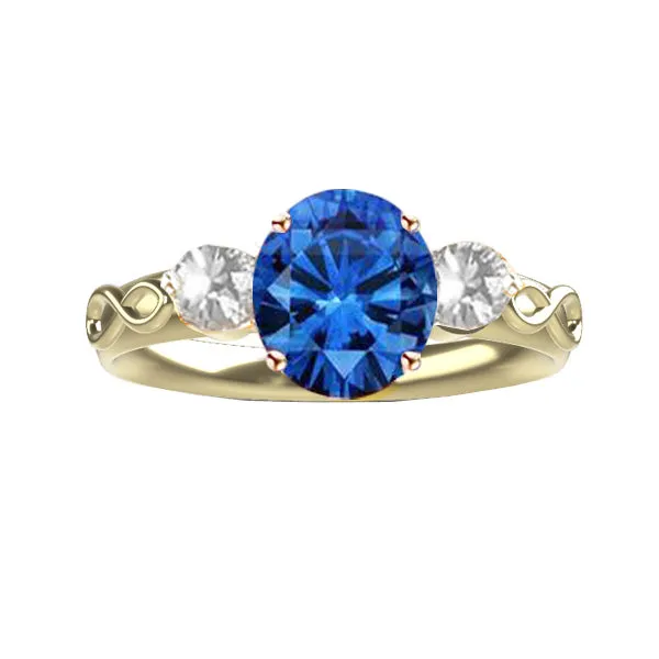 SCOTTISH INFINITY ENGAGEMENT RING WITH SAPPHIRE AND TWO DIAMONDS