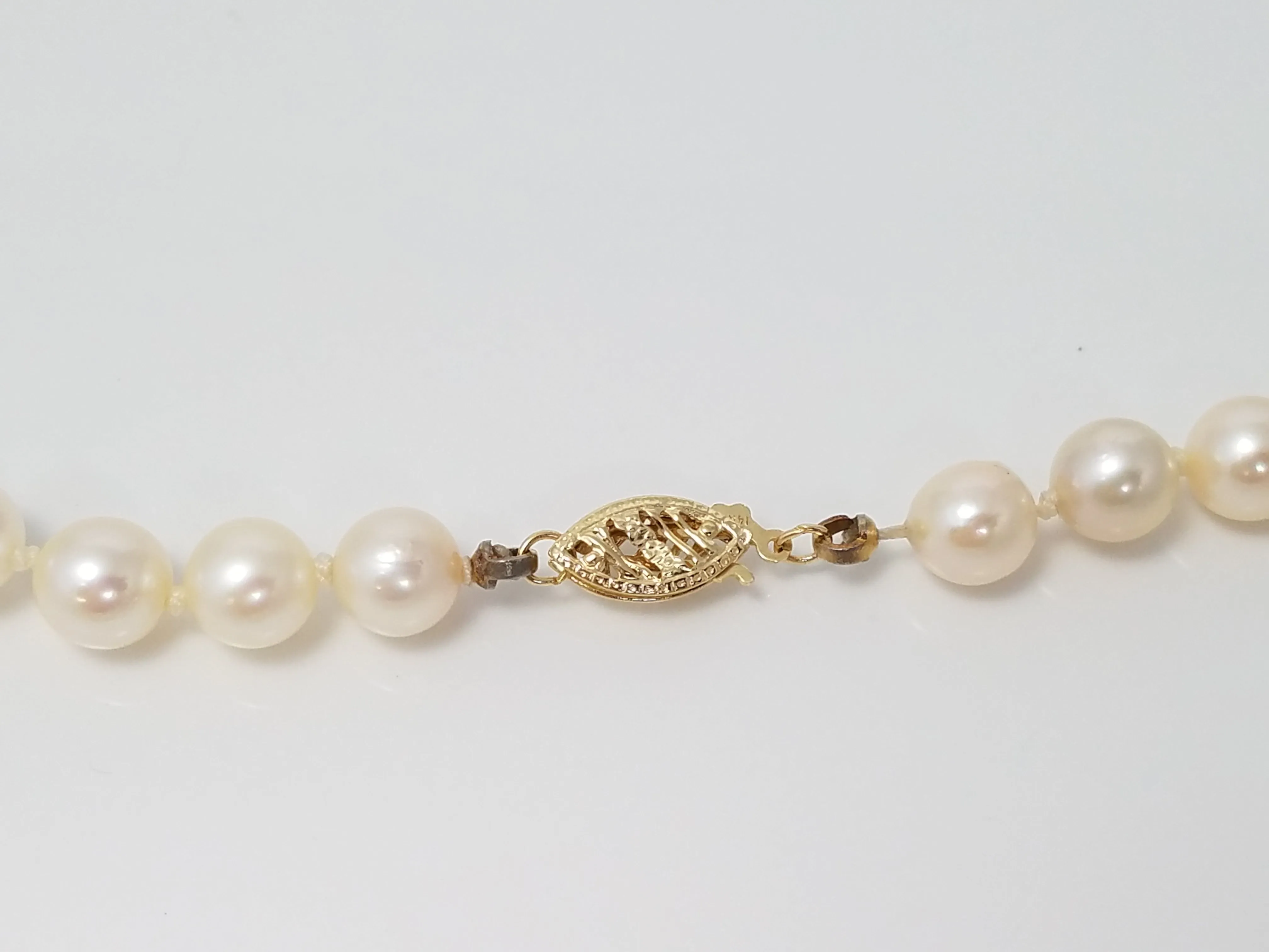 Timeless 25" 14k Yellow Gold Natural Cultured Saltwater Pearl Strand